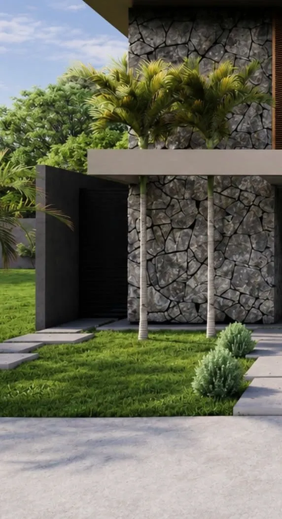 Fachada com parede de pedra e palmeira